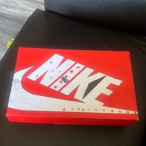 All black Nike shoes